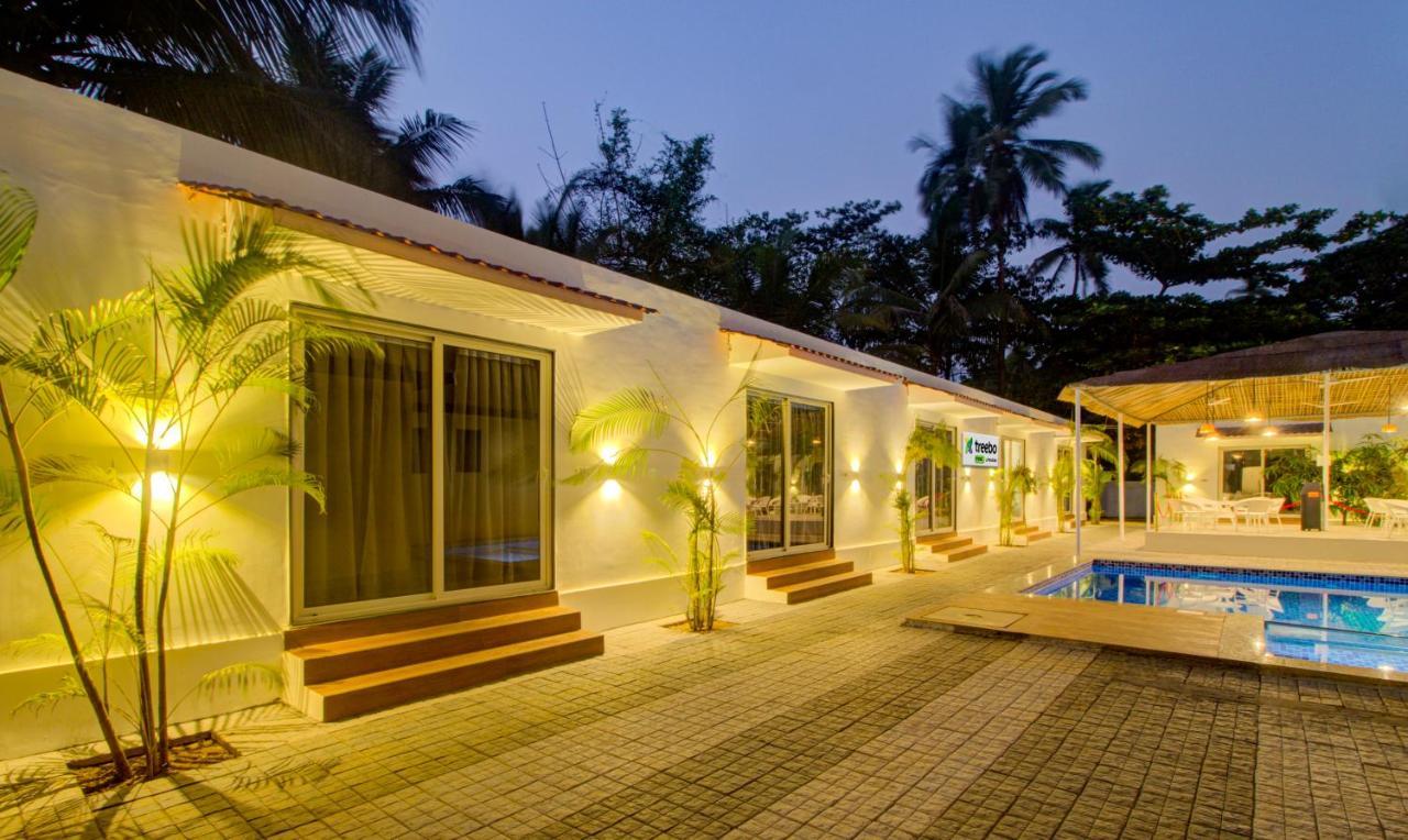 Treebo Code Red Hotel Morjim Bagian luar foto
